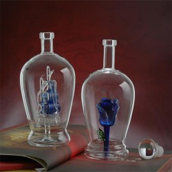 白酒酒瓶生產(chǎn)廠家定做內(nèi)置藍色花朵工藝玻璃酒瓶